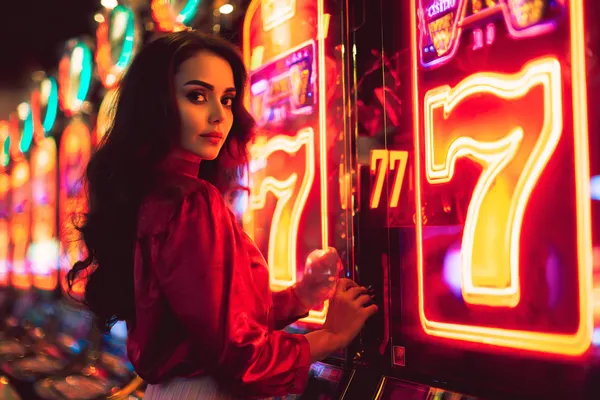 A young woman relaxing with her phone while dynamic casino elements float around her, illustrating the smooth mobile experience offered by the AMJILI app.